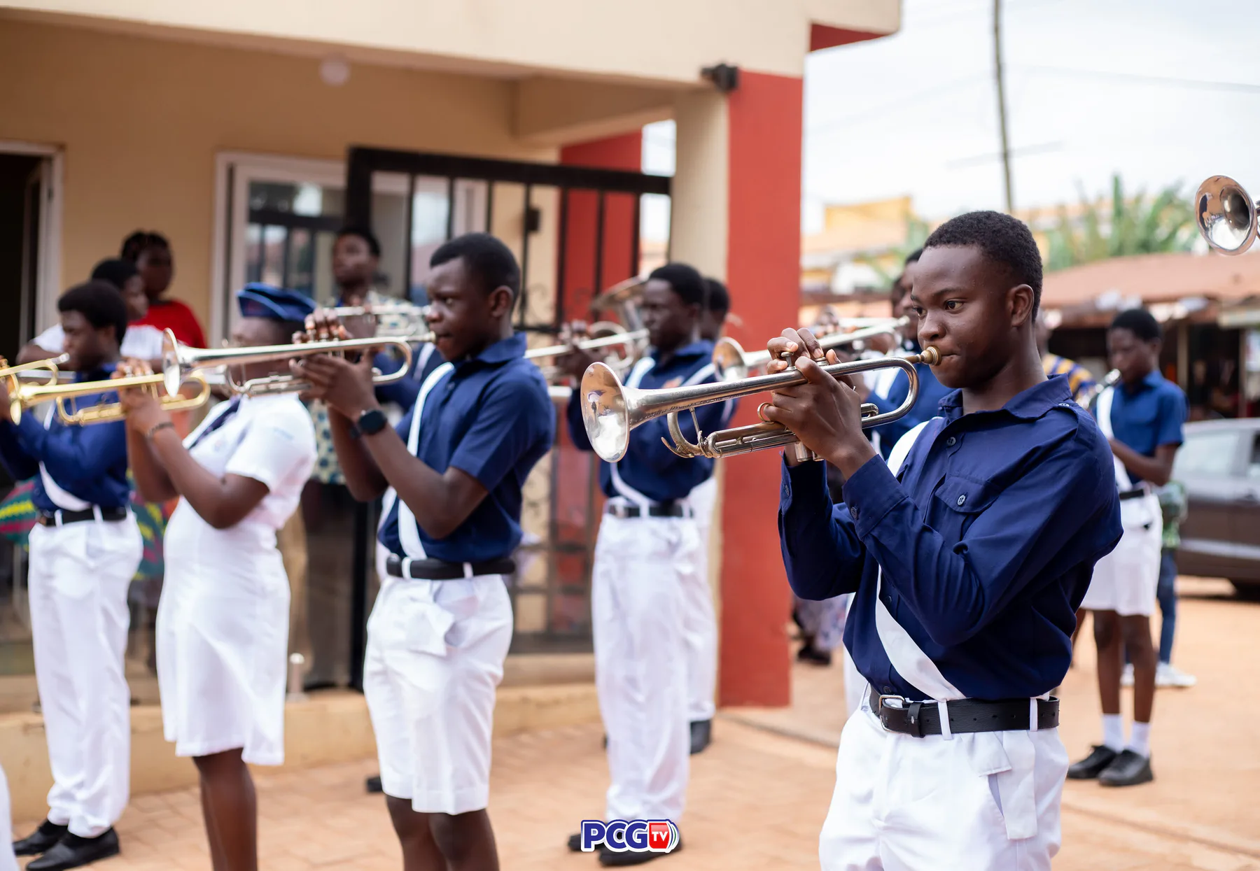 A Presbyterian youth brass band performing outdoors