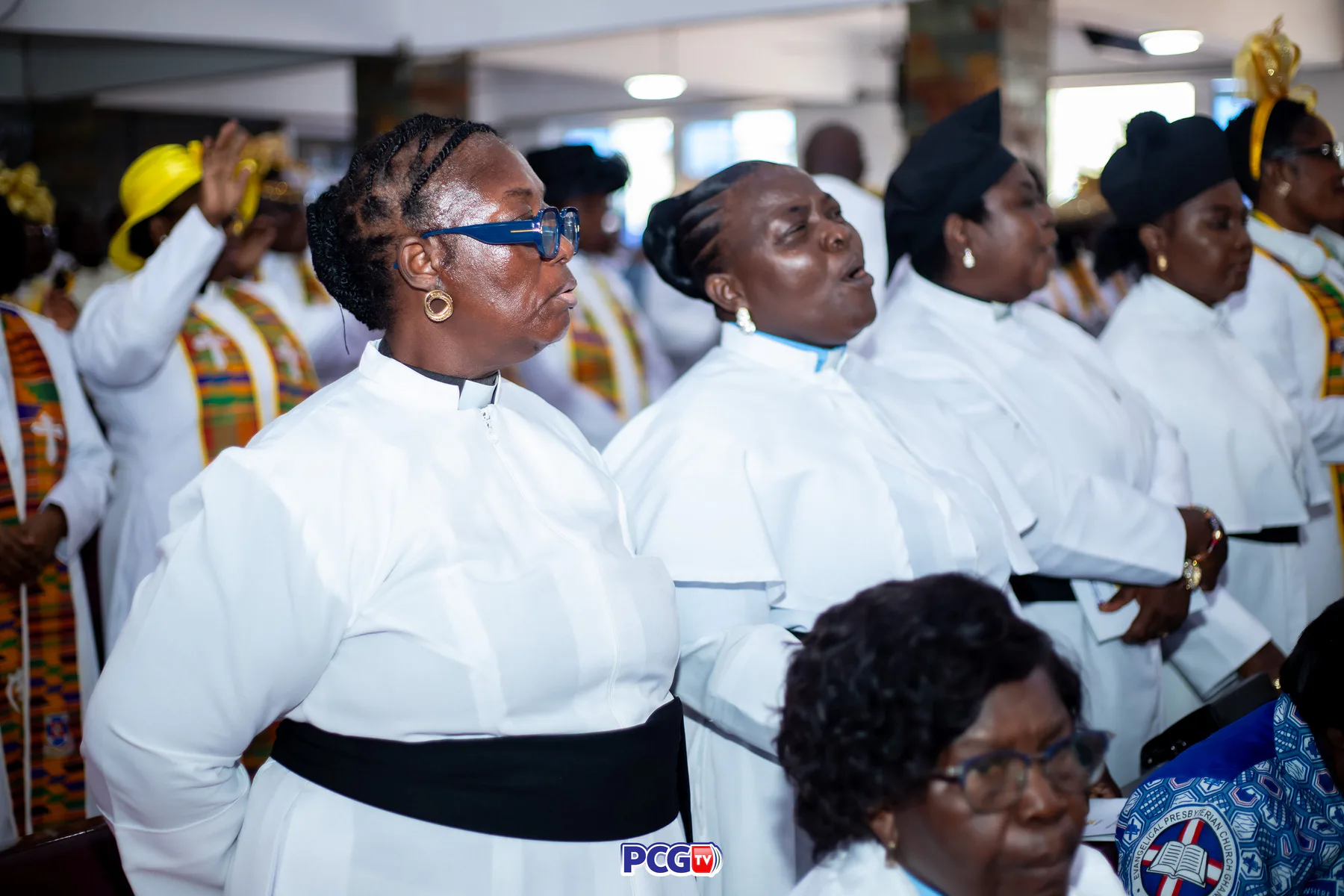 Female Presbyterian ministers standing together in worship