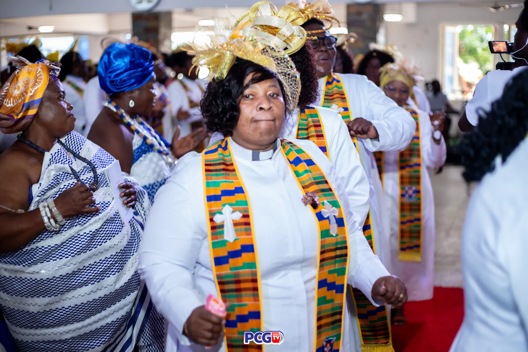 A female Presbyterian minister dancing during worship