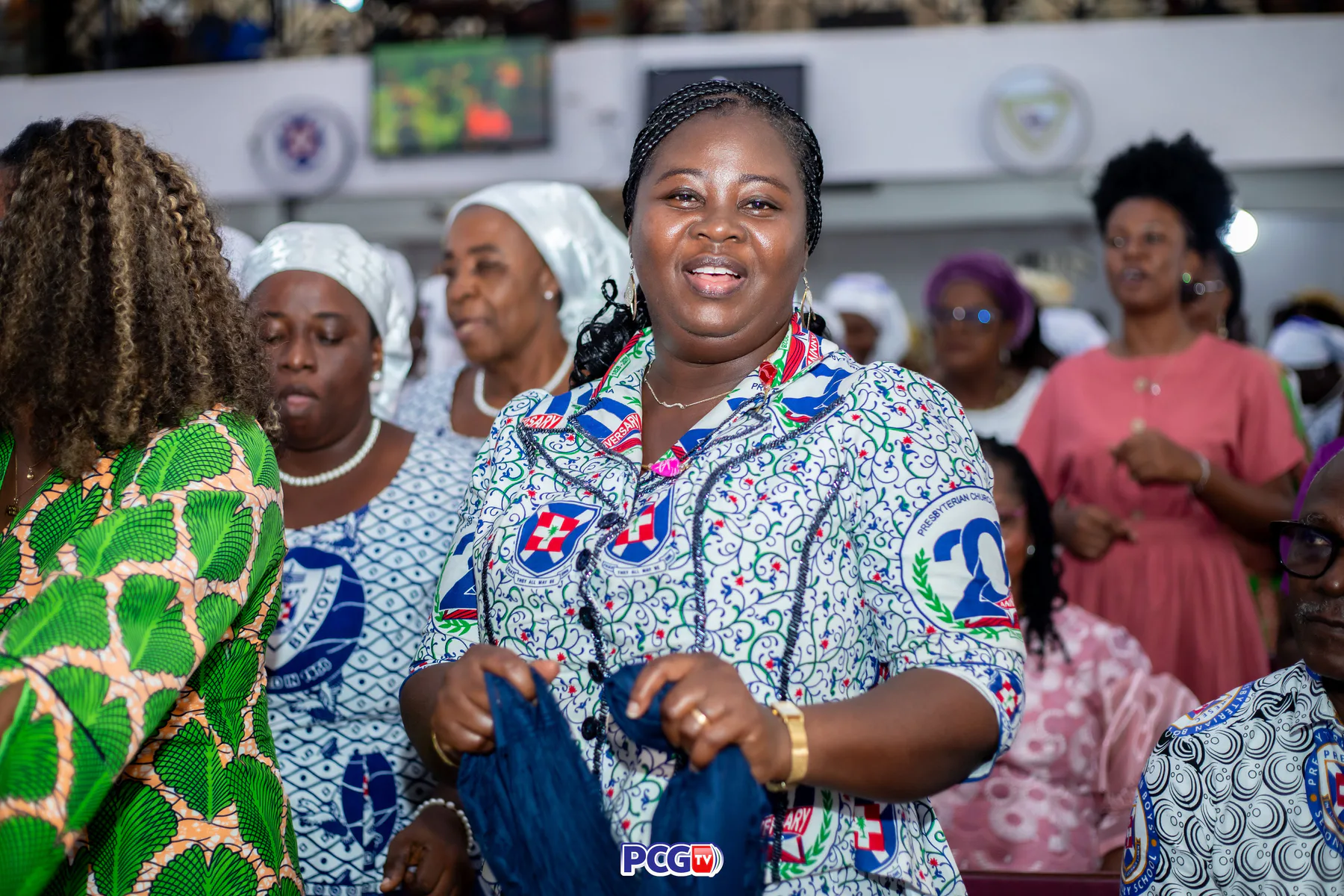 A Presbyterian woman singing during worship