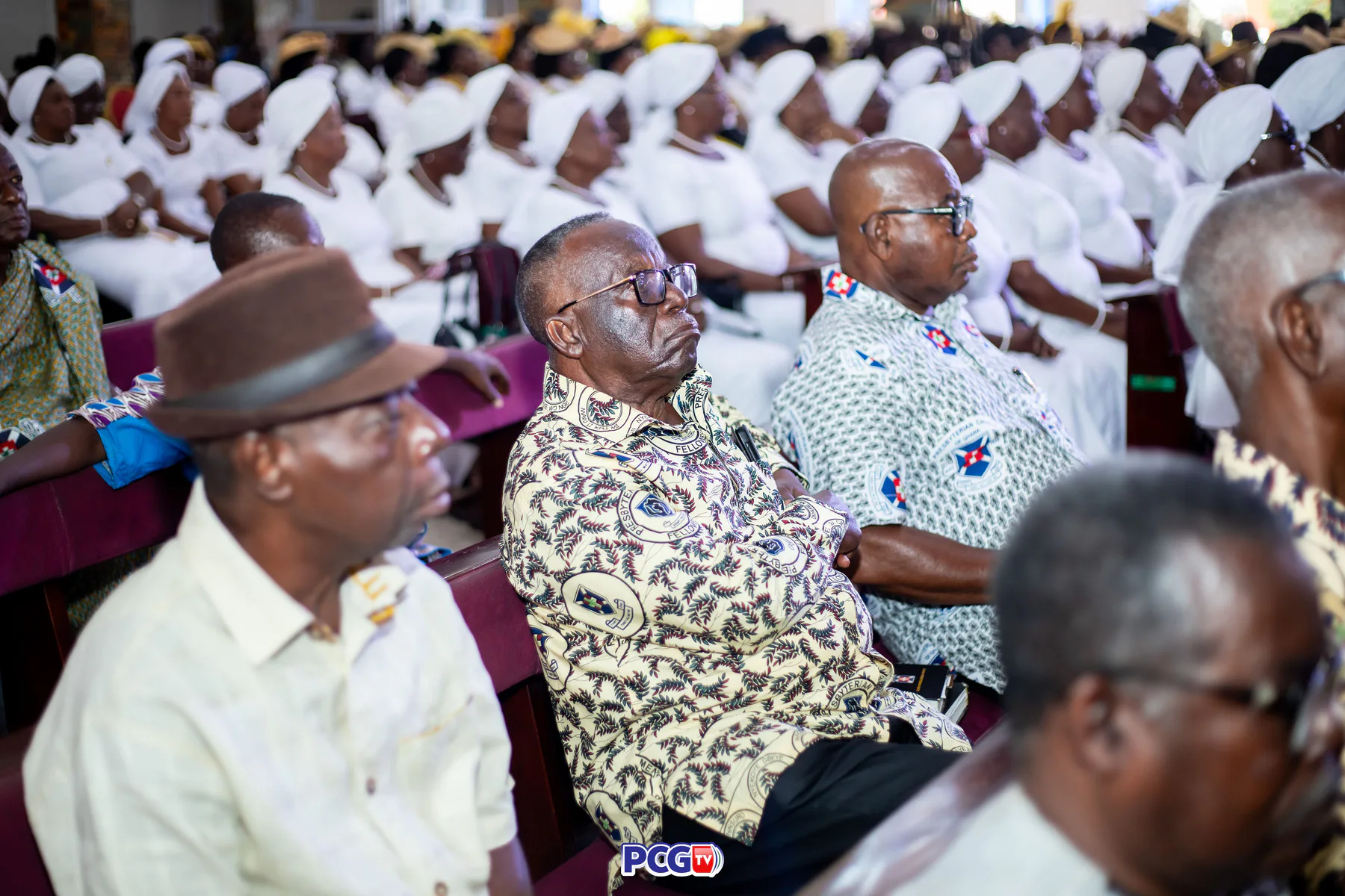 Presbyterian men seated during a church service