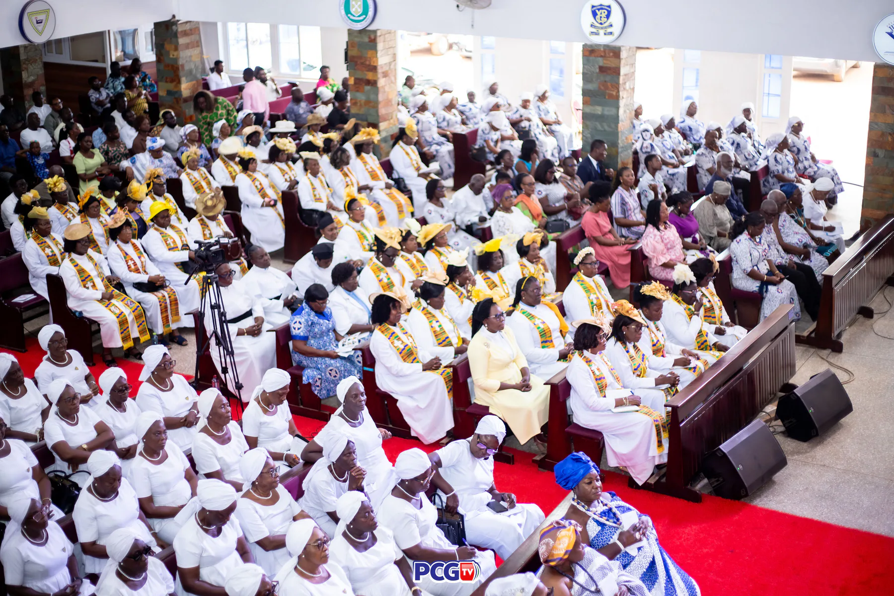 A wide view of a Presbyterian congregation seated for worship