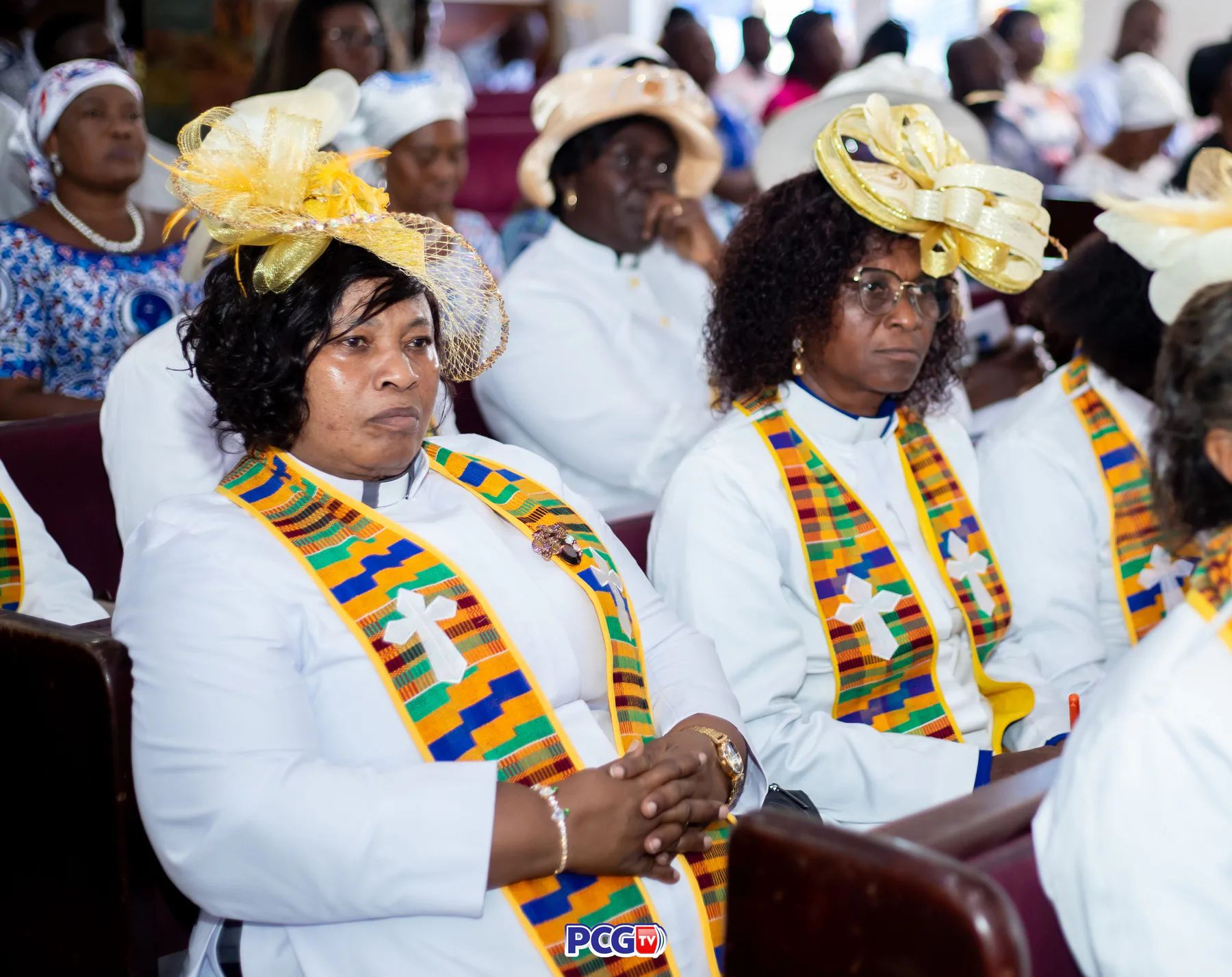 Female Presbyterian ministers seated together in church