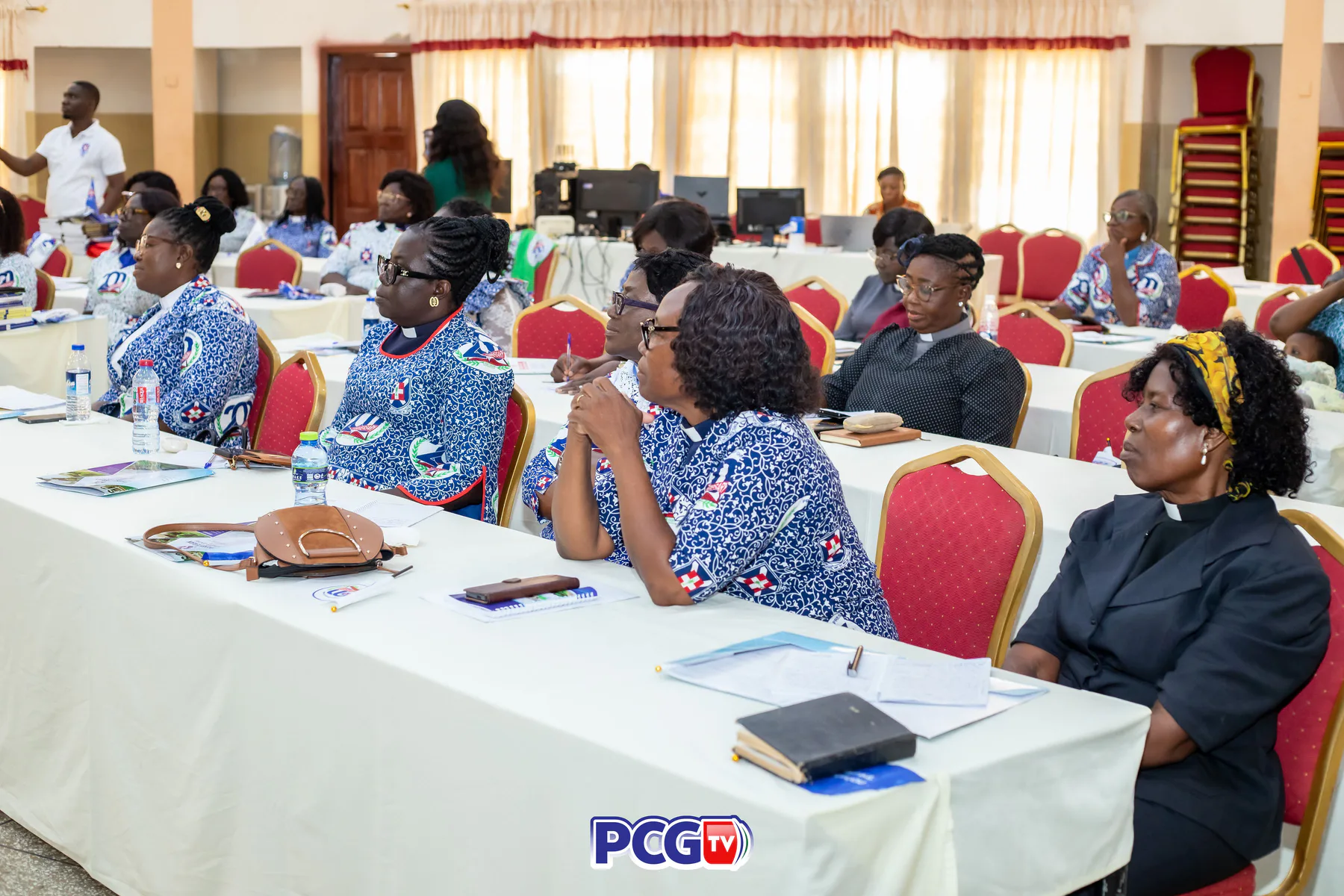 Presbyterian women participating in a conference session
