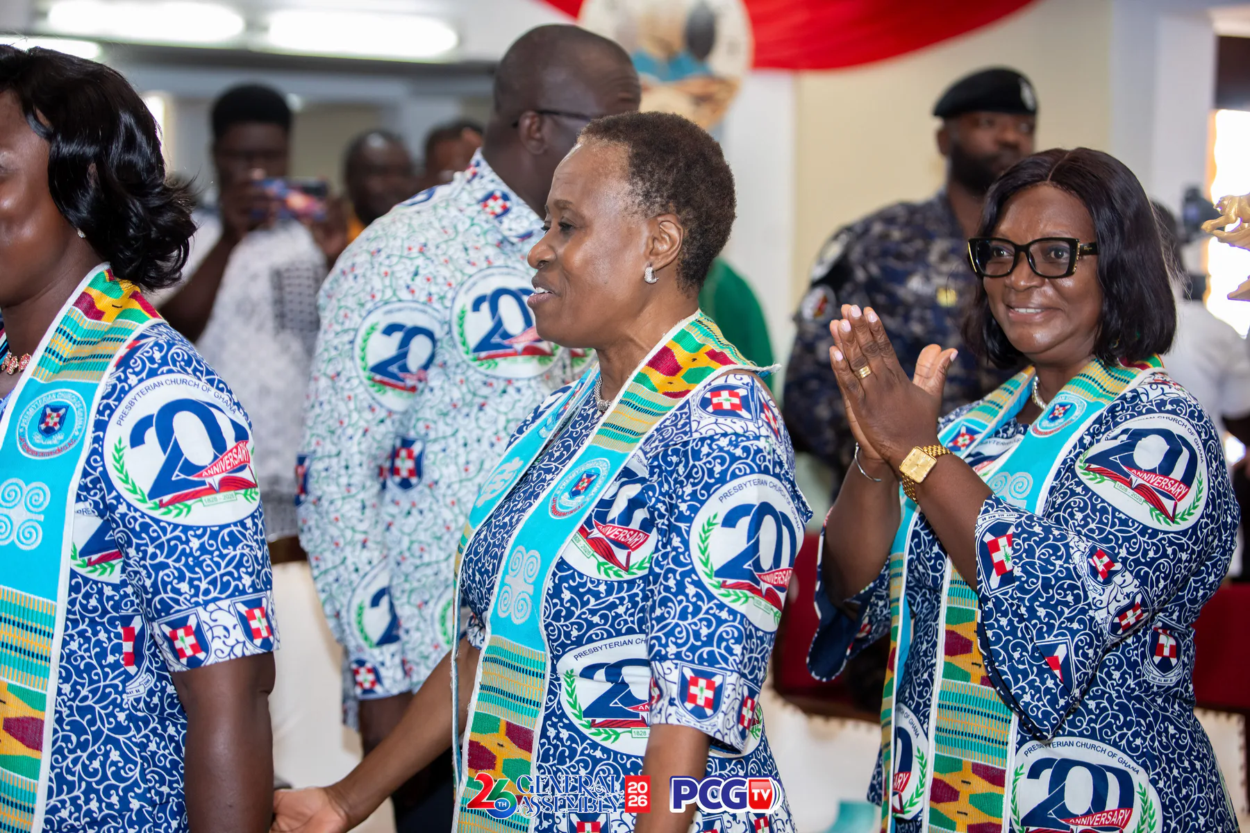 Presbyterian women applauding during a church gathering