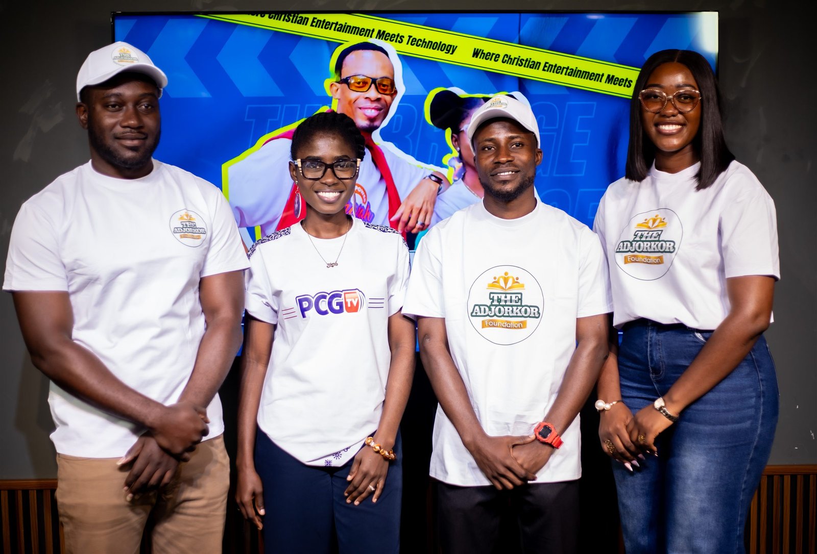 The Bridge team and programme guests standing together in the PCGTV studio